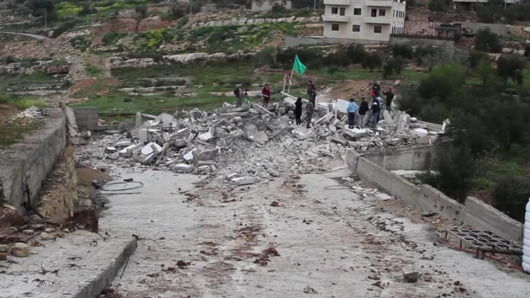 VIDEO: Israeli bulldozers demolish home of Palestinian attacker Israeli bulldozers demolished a Palestinian-owned house in the village of Kobar, north of the West Bank, today (March 7).The owner of the house, Assem Omar al-Barghouthi, is held by Israel on suspicion of killing two Israeli soldiers in December 2018.Aftermath footage shows a group of men raising a Palestinian flag on top of the remains of the building.It is believed that Assem al-Barghouti carried out the attack after his brother was killed by Israeli forces during an ambush in Ramallah.