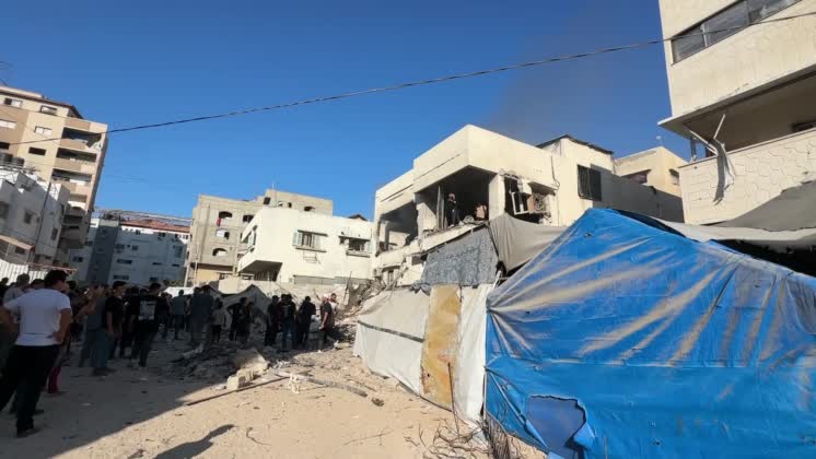 VIDEO: Palestinians inspect damage after strike west of Gaza City RESTRICTION SUMMARY: APAwire CLIENTS ONLY SHOTLIST: APAwire - APAwire CLIENTS ONLY, Gaza City, Gaza Strip, September 2026. Palestinians inspect damage at the site of an Israeli strike that targeted a house west of Gaza City as Palestinian Civil Defense teams work to extinguish a fire and assess destruction to nearby tents sheltering displaced people...SOUNDBITES:.0.1 SOUNDBITE (in Arabic) Hanan al-Arayeshi, displaced Palestinian at the targeted site..STORYLINE:.Palestinians inspect damage at the site of an Israeli strike that targeted a house west of Gaza City in the Gaza Strip, while Palestinian Civil Defense teams work to extinguish a fire. The strike caused destruction to the building and to tents sheltering displaced people in the surrounding area.