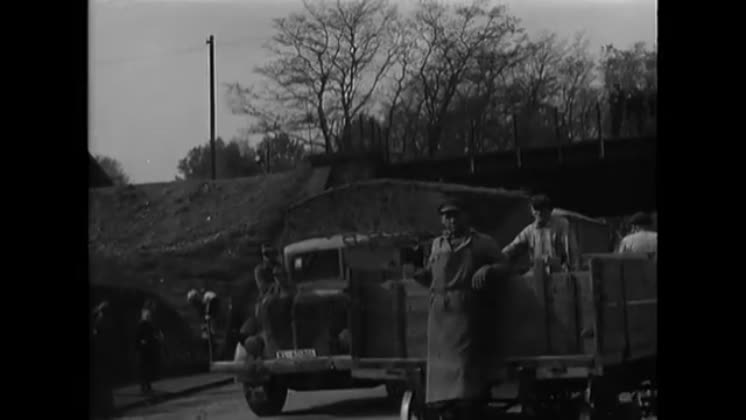 Video: 1945 - A long line of army vehicles, loaded with Germans, are ...